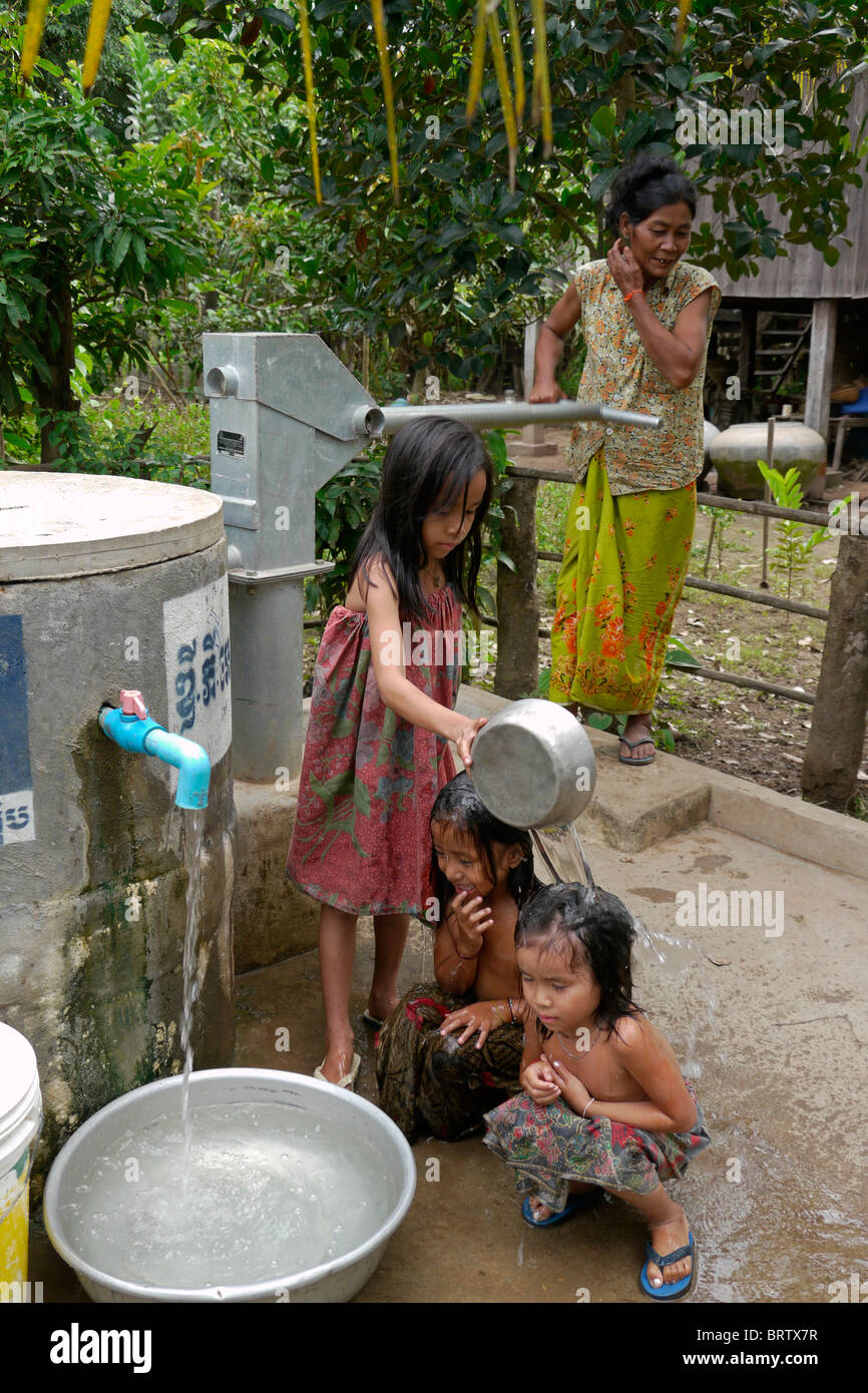 bathing children cambodia CAMBODIA Girls taking a bath Stock Photo - Alamy