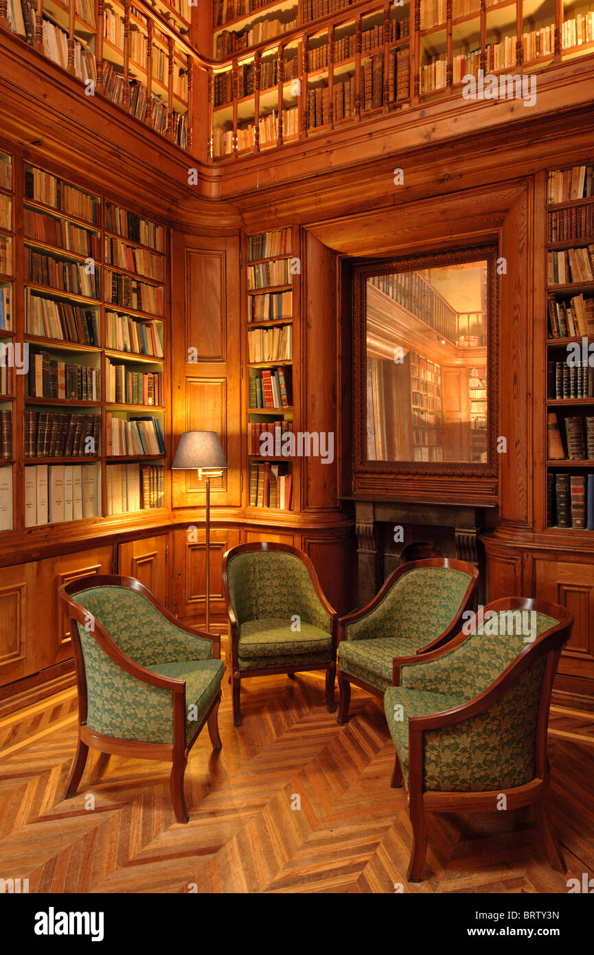 Bookshelves full of old books in private library Stock Photo - Alamy