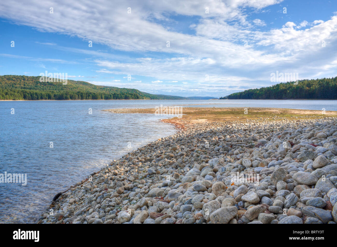 rocky beach at reservoir with beautiful view Stock Photo