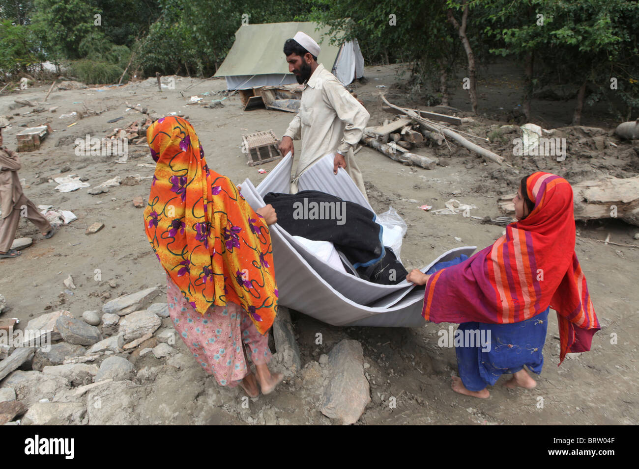 Charity distribution flood victims in hi-res stock photography and ...