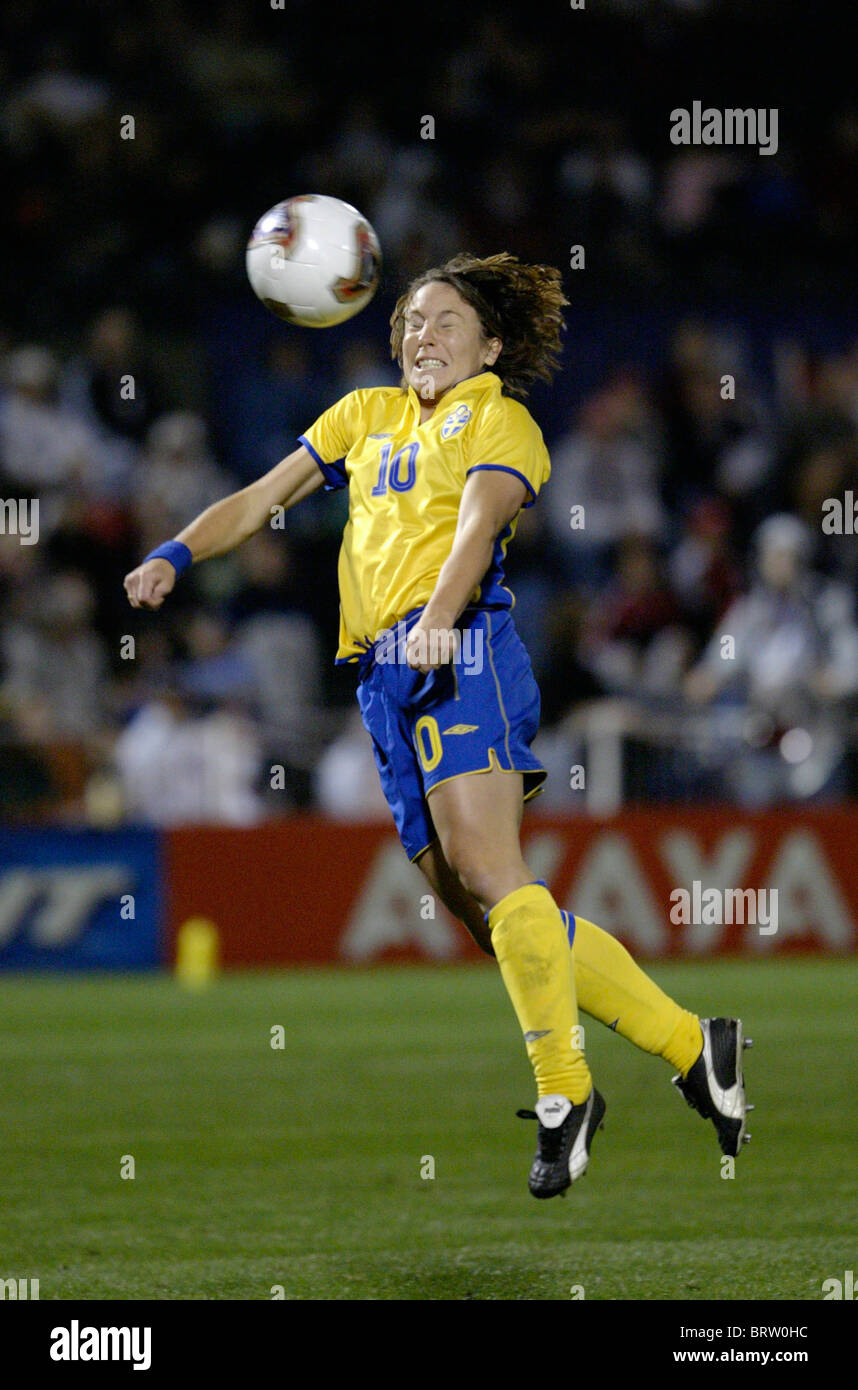 Hanna Ljungberg of Sweden heads the ball against Canada during a 2003 Women's World Cup semifinal match. Stock Photo