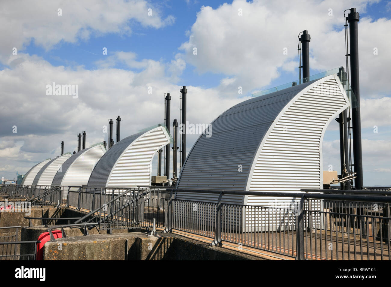 Barrage tidal flow control sluices separate fresh water in bay from the sea and provide flood def Cardiff Bay, South Wales, UK. Stock Photo