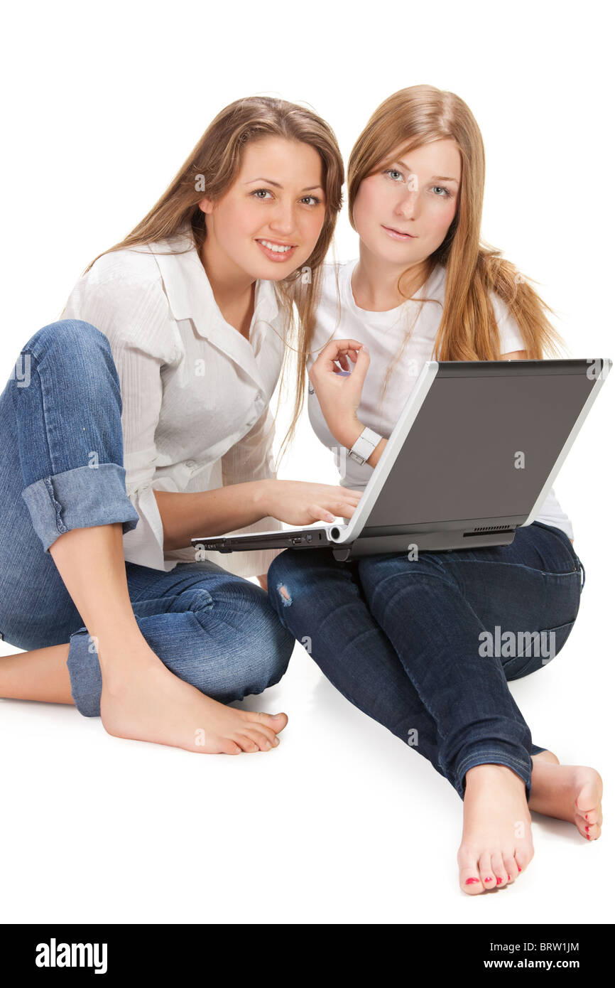 two young happy student girl work on laptop computer Stock Photo - Alamy