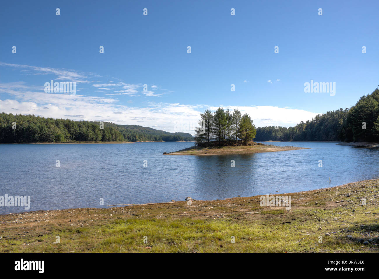 small island in cove on lake during fall Stock Photo