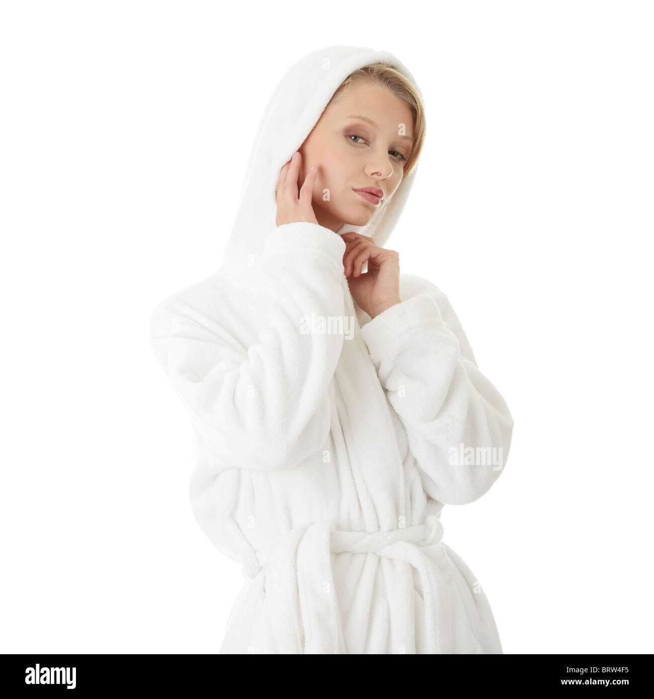 Young beautiful blond teen woman in bathrobe, isolated on white Stock ...