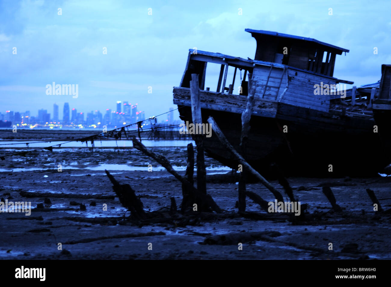 pier scene with singapore, belakang padang, riau islands, indonesia Stock Photo