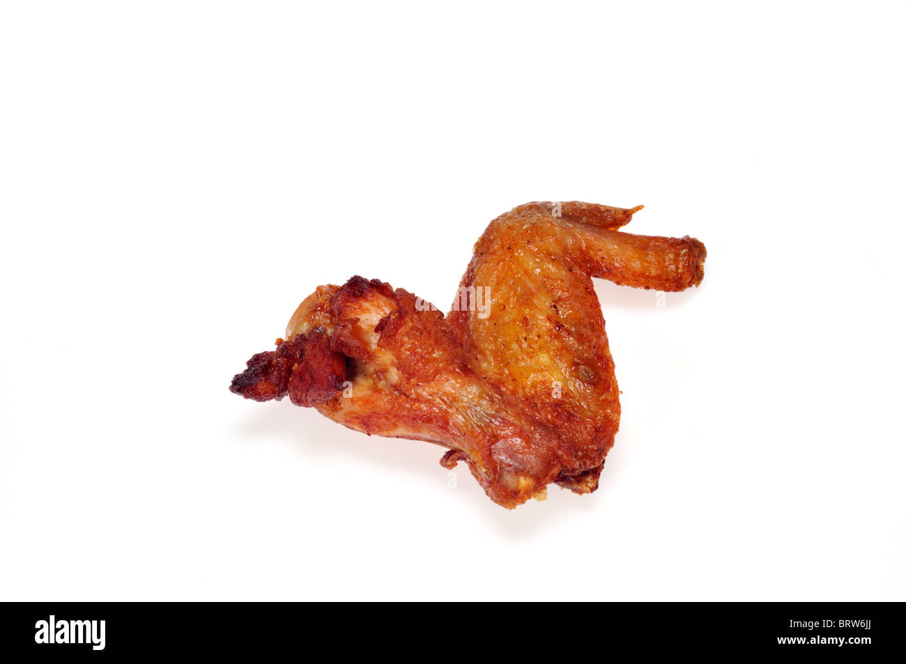 Single fried chinese chicken wing isolated on white background cutout. Stock Photo