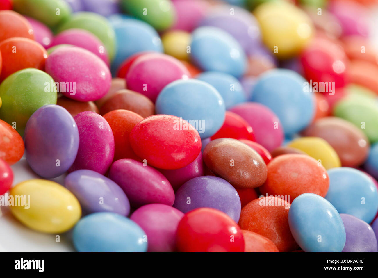 Coloured chocolate drops Stock Photo Alamy