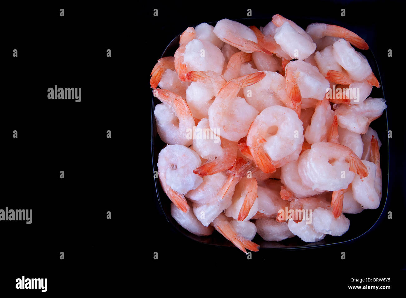 one big pile of frozen shrimp closeup macro photo Stock Photo