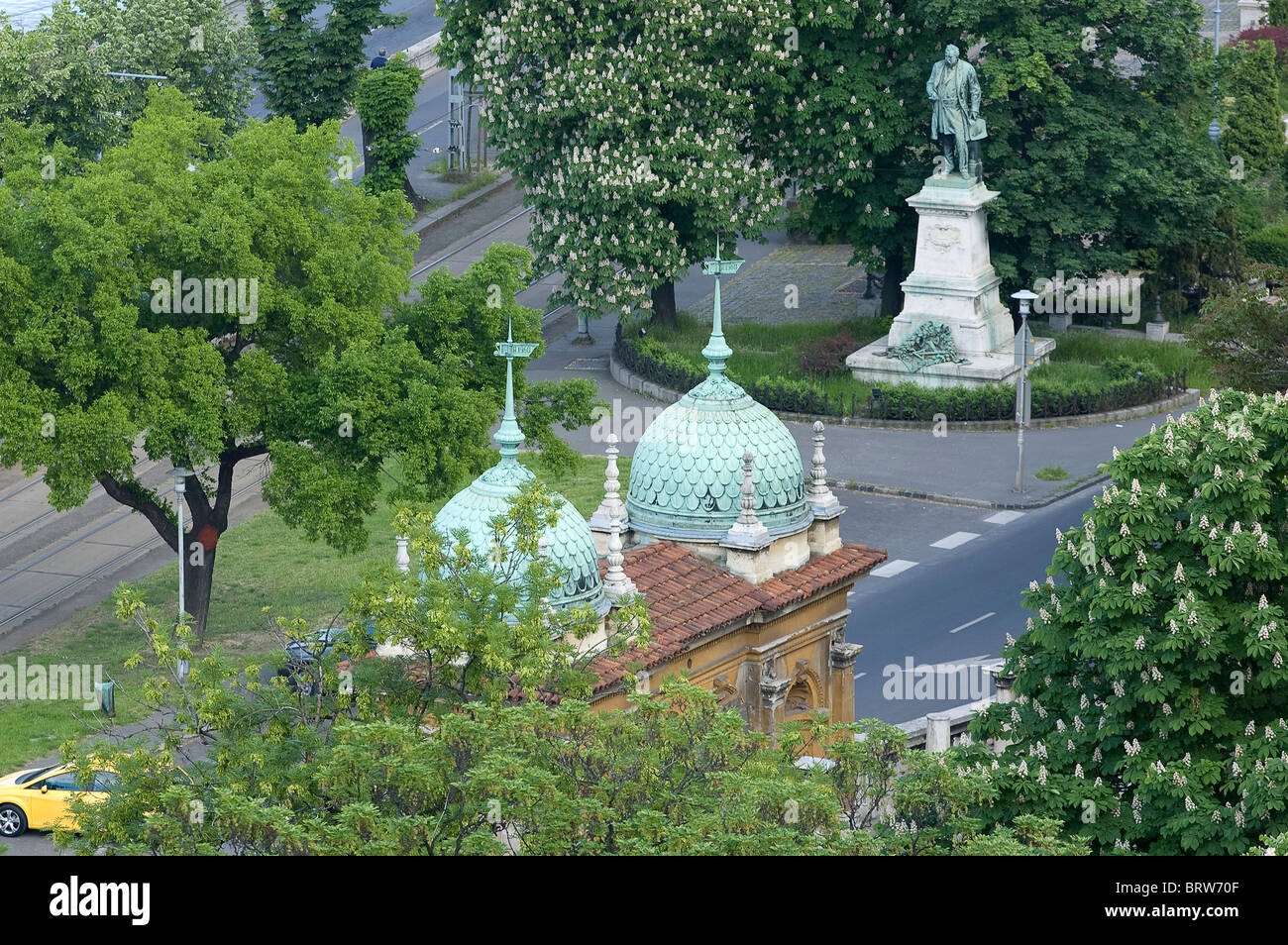 Cupolas of the Castle Garden Bazaar and the statue of Ybl Miklos