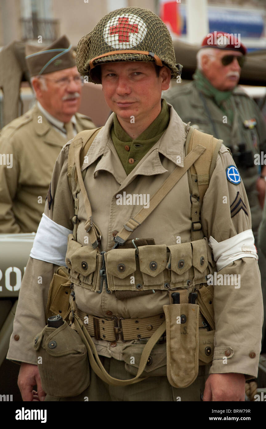 France, Normandy, Arromanches. Man in vintage corporal WWII medic uniform, 66th Anniversary of D-Day. Stock Photo