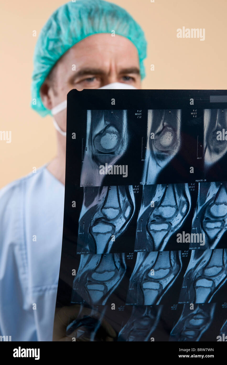Surgeon regarding an x-ray Stock Photo