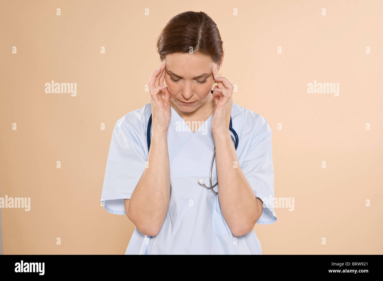 Portait of an overworked doctor Stock Photo