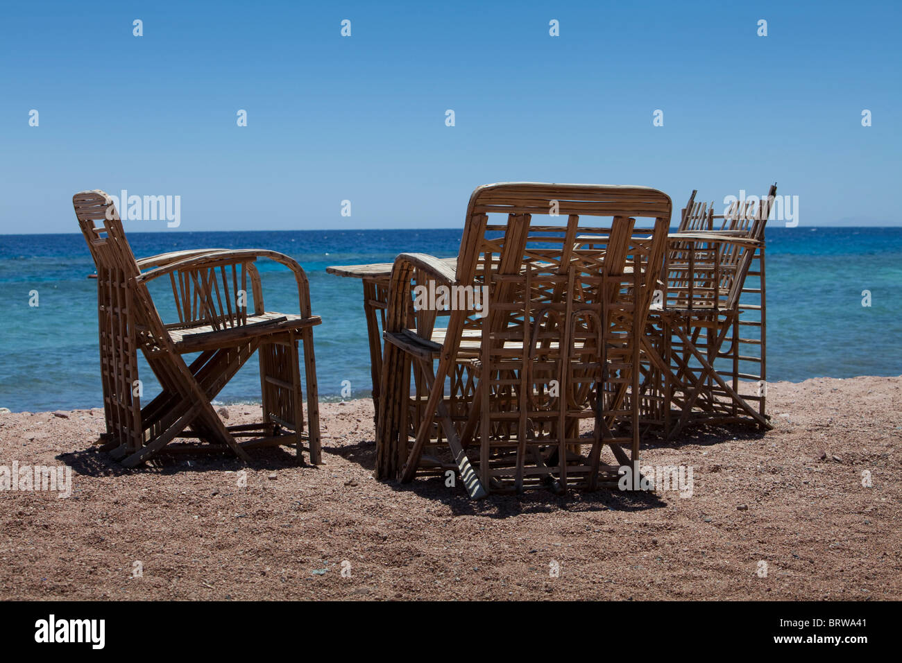 Cane table and chairs on a beach Three Pools Dahab Egypt Stock Photo Alamy