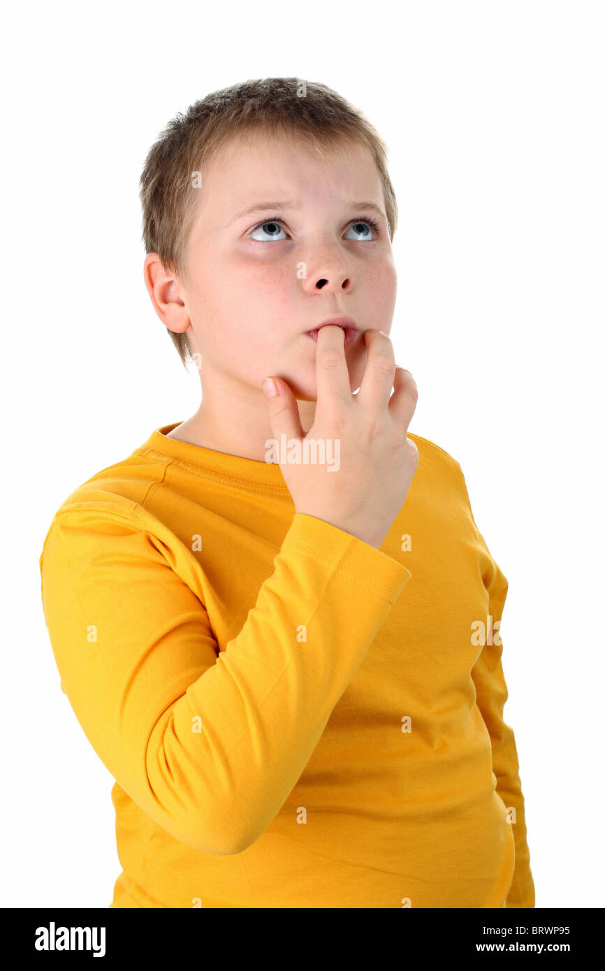 10 Year Old Boy Tasting His Own Finger Isolated On White Stock Photo