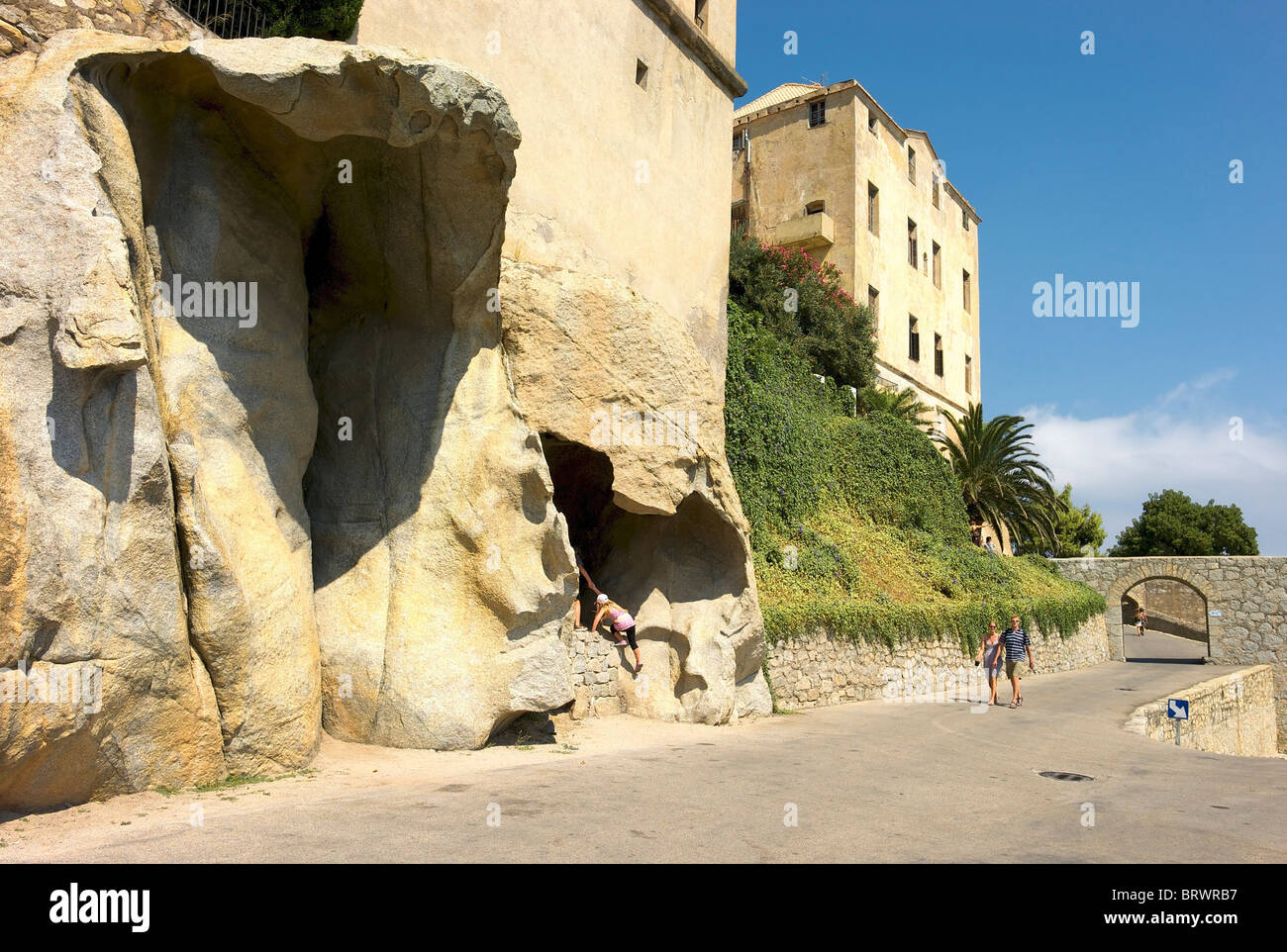 Natural caves in stone near the citadel in Calvi. Stock Photo