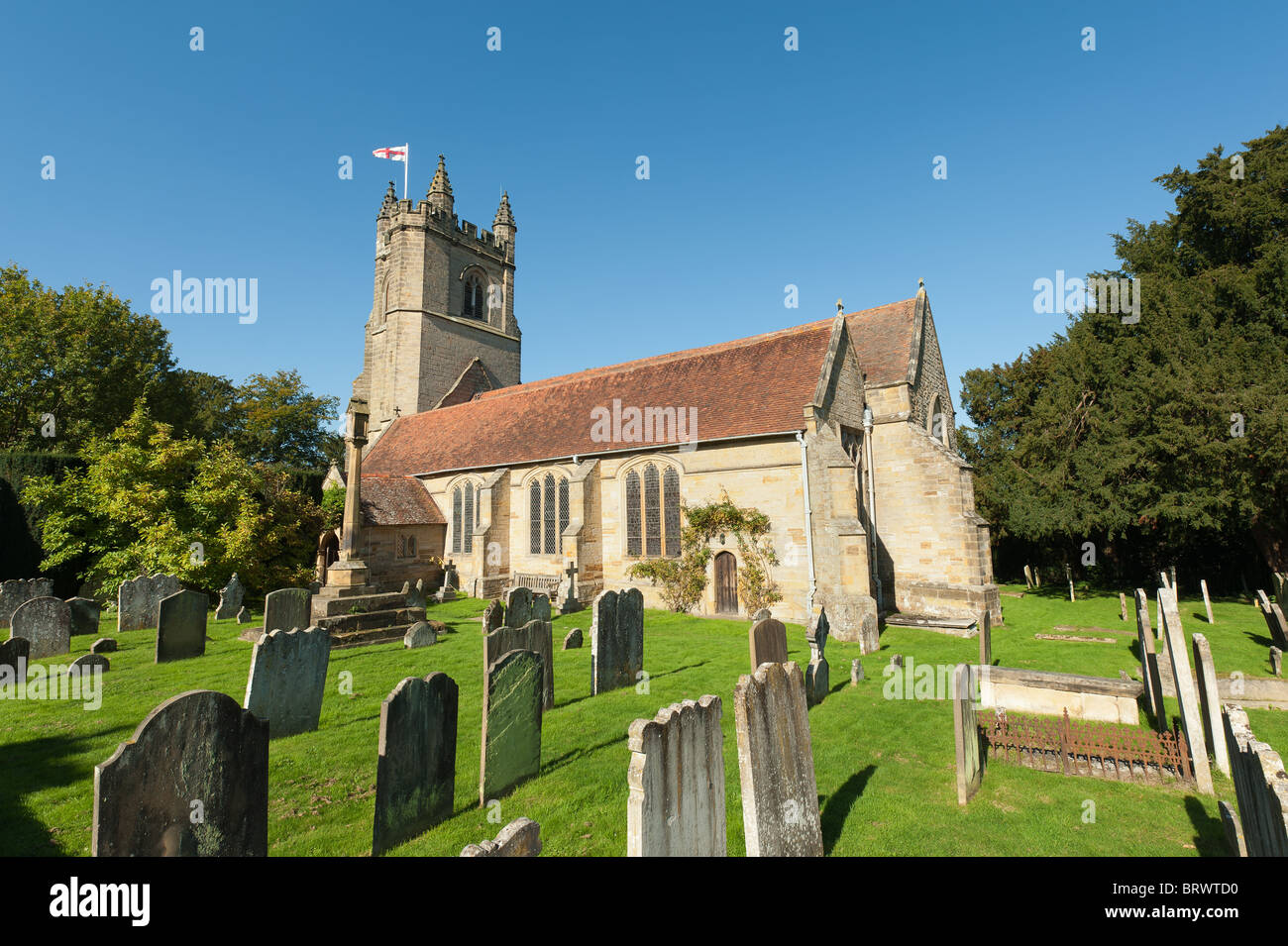 St Mary the Virgin Chiddingstone Church Kent England on bright sunny day with blue skies and well kept grounds Stock Photo
