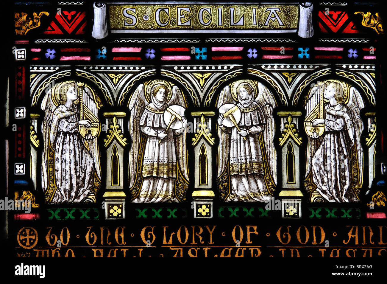 Angel musicians stained glass, Holy Trinity Church, Shenington, Oxfordshire, England, UK Stock Photo