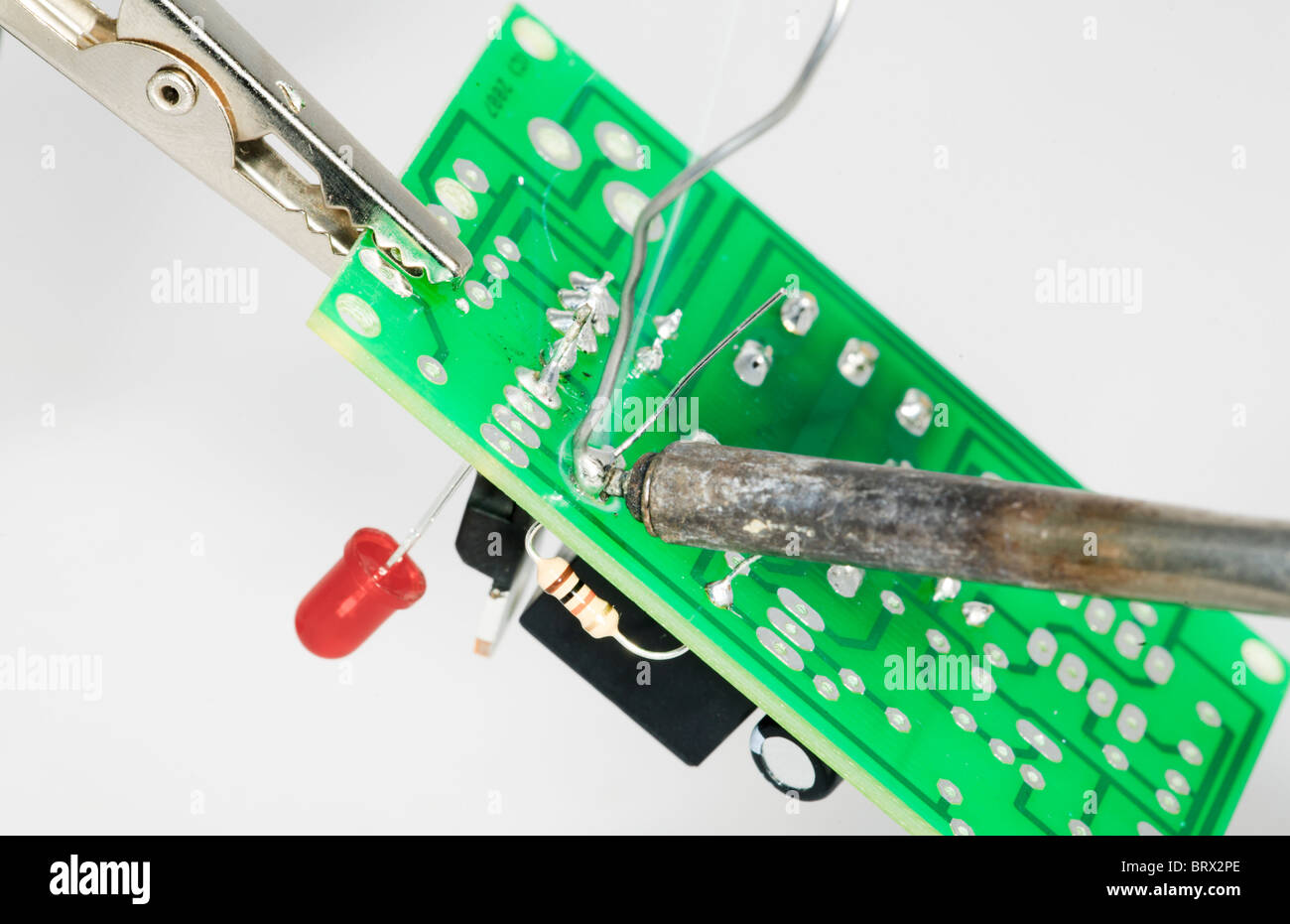 Soldering a resistor to a PCB Stock Photo Alamy