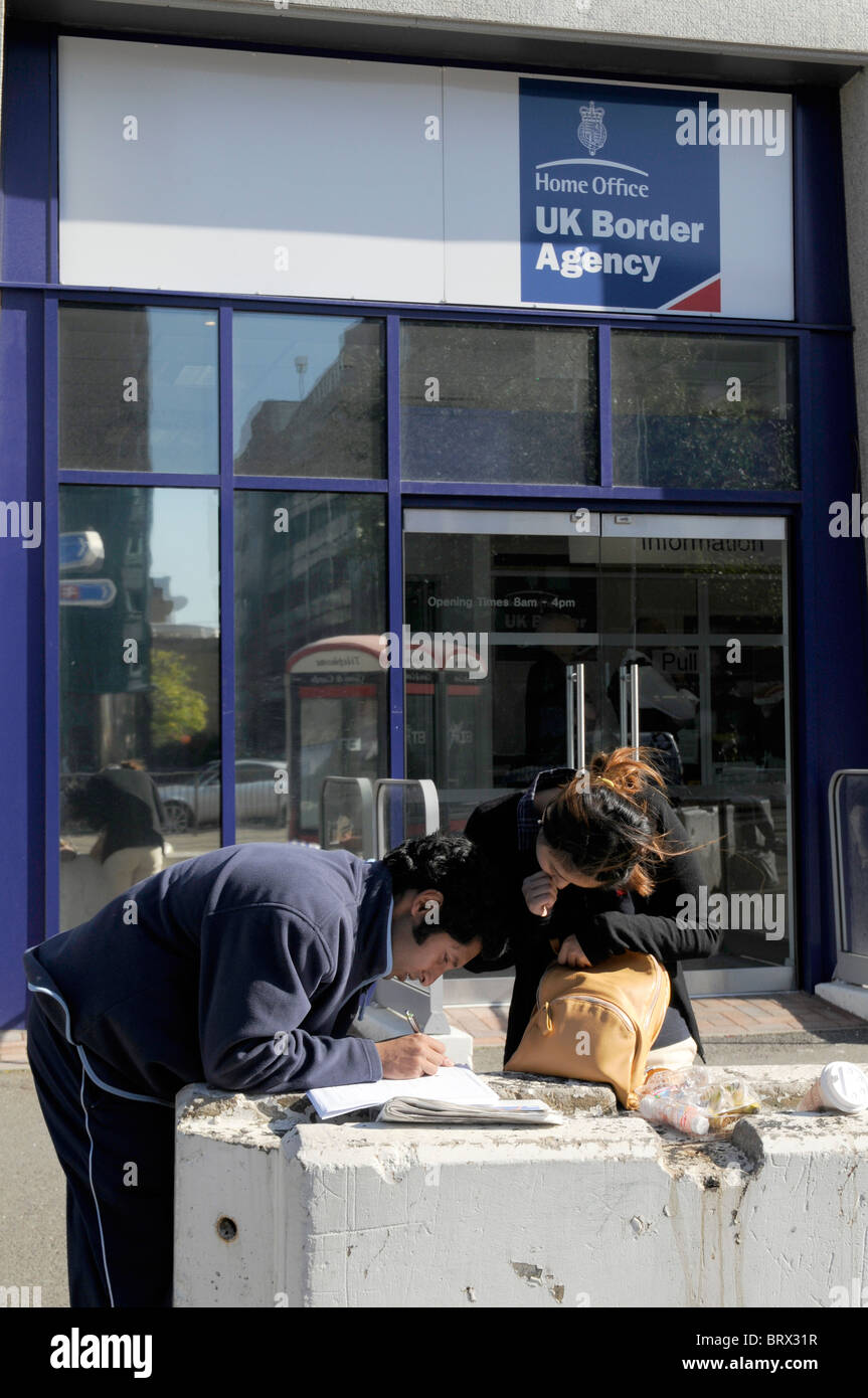 IMMIGRANTS FILL FORMS FOR UK RESIDENCE APPROVAL OUTSIDE HOME OFFICE IN