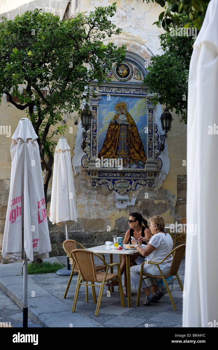 2 females sitting at outside cafe in Jerez. Stock Photo