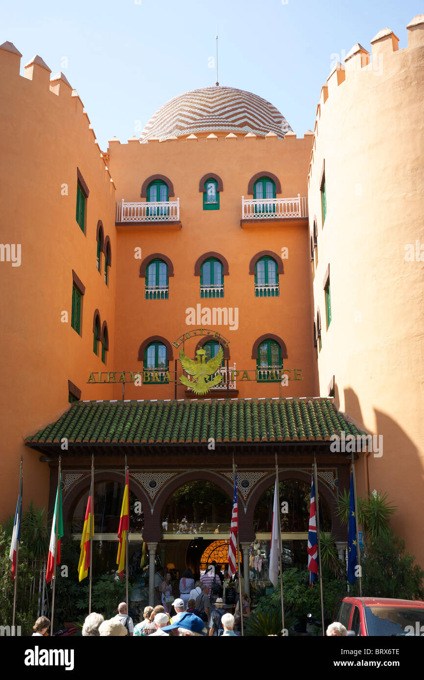 Group of tourists entering the Alhambra Palace Hotel in Granada. Stock Photo