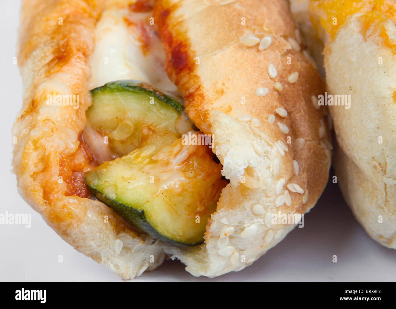 closeup of zucchini grinder sandwiches with melted mozzarella Stock