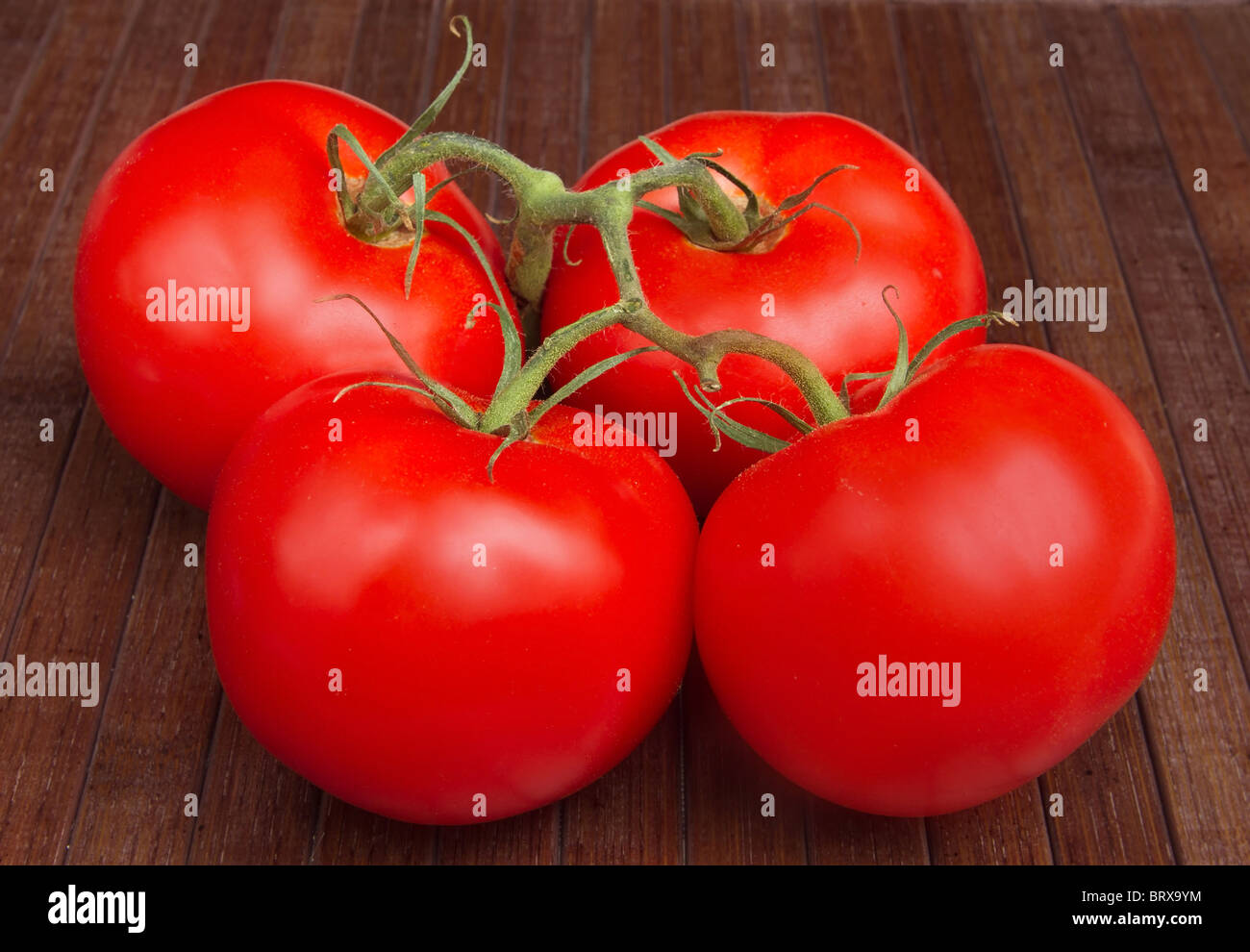 Four tomatoes hi-res stock photography and images - Alamy