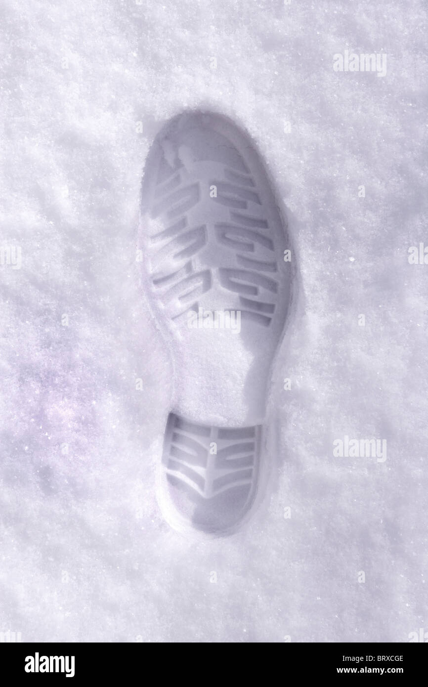Shoeprint in snow Stock Photo
