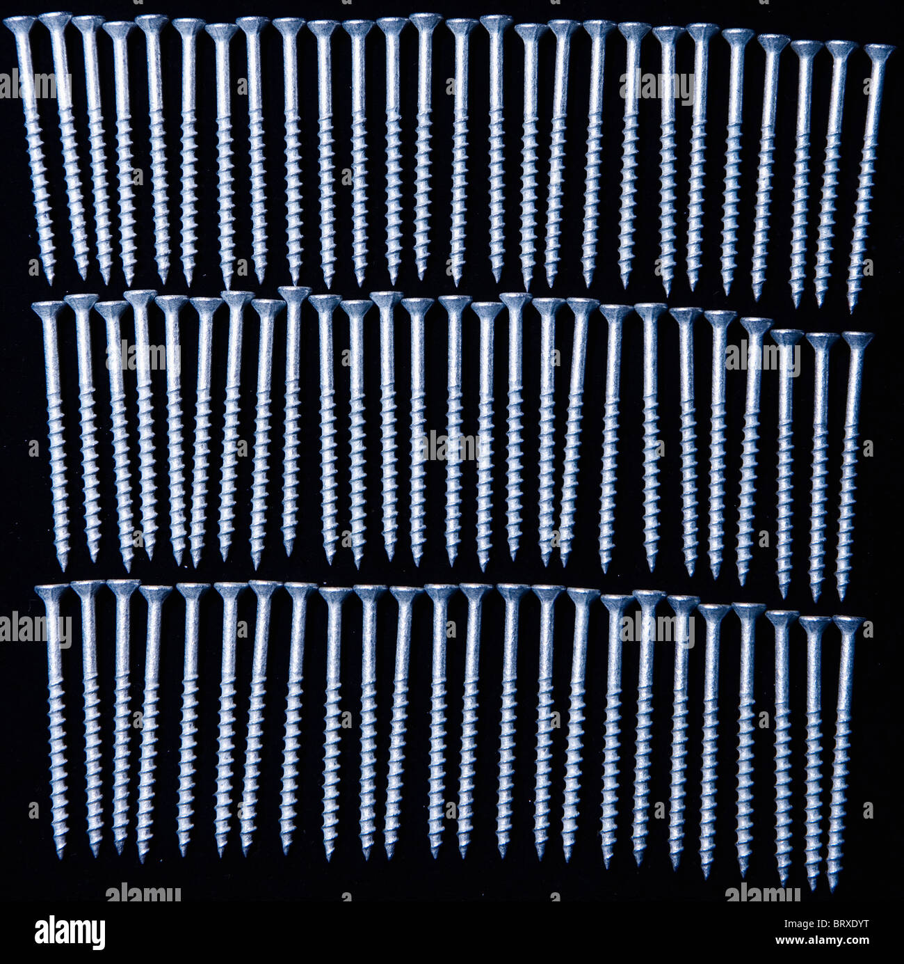 Screw Rows Design Rows of screws Stock Photo - Alamy