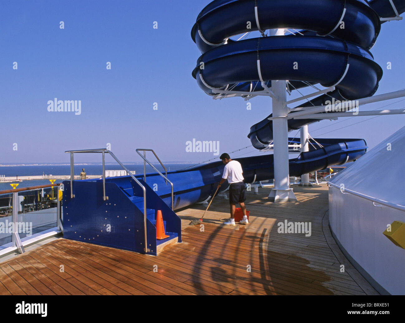 cleaner at work on cruise ship deck Stock Photo Alamy
