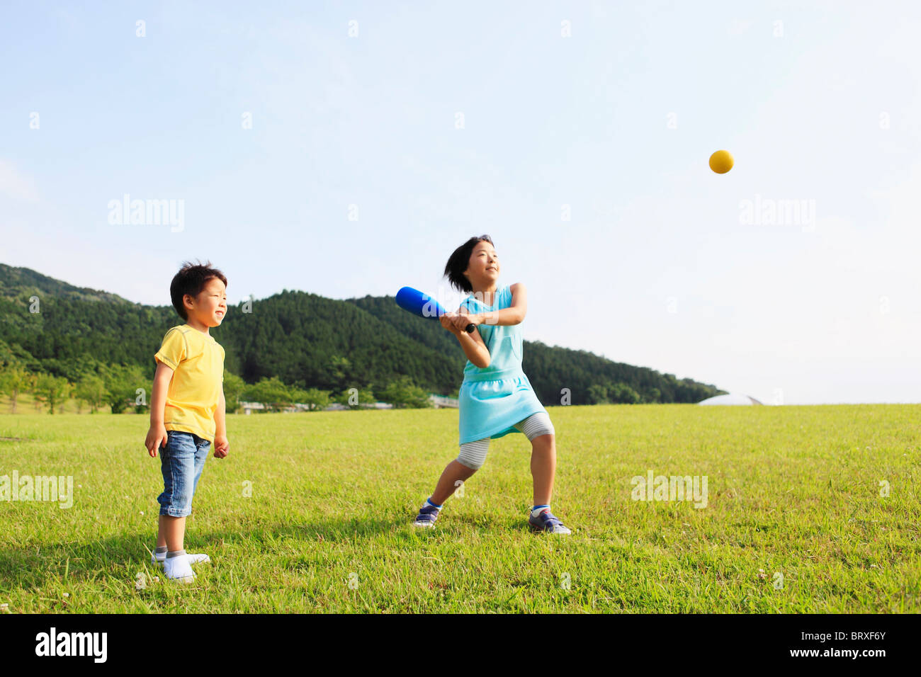 Boy and Girl Playing Softball Stock Photo Alamy