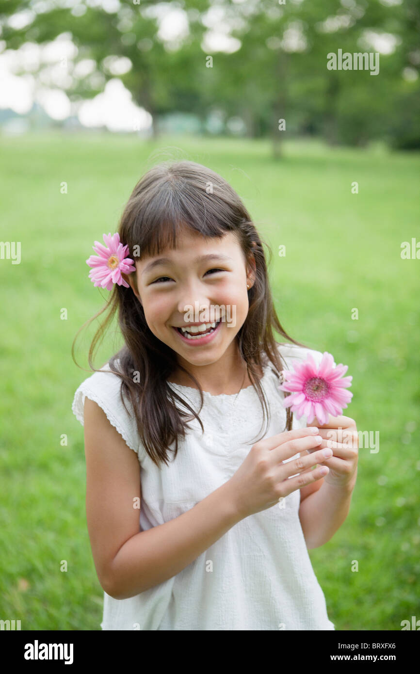 Girl With a Flower in her Hair Stock Photo - Alamy