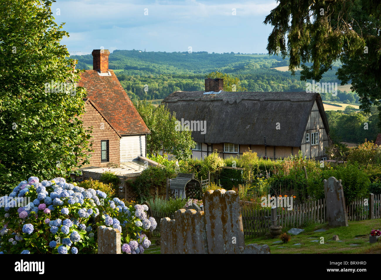 View over traditional Sussex cottages to Brightling and High Weald landscape Stock Photo