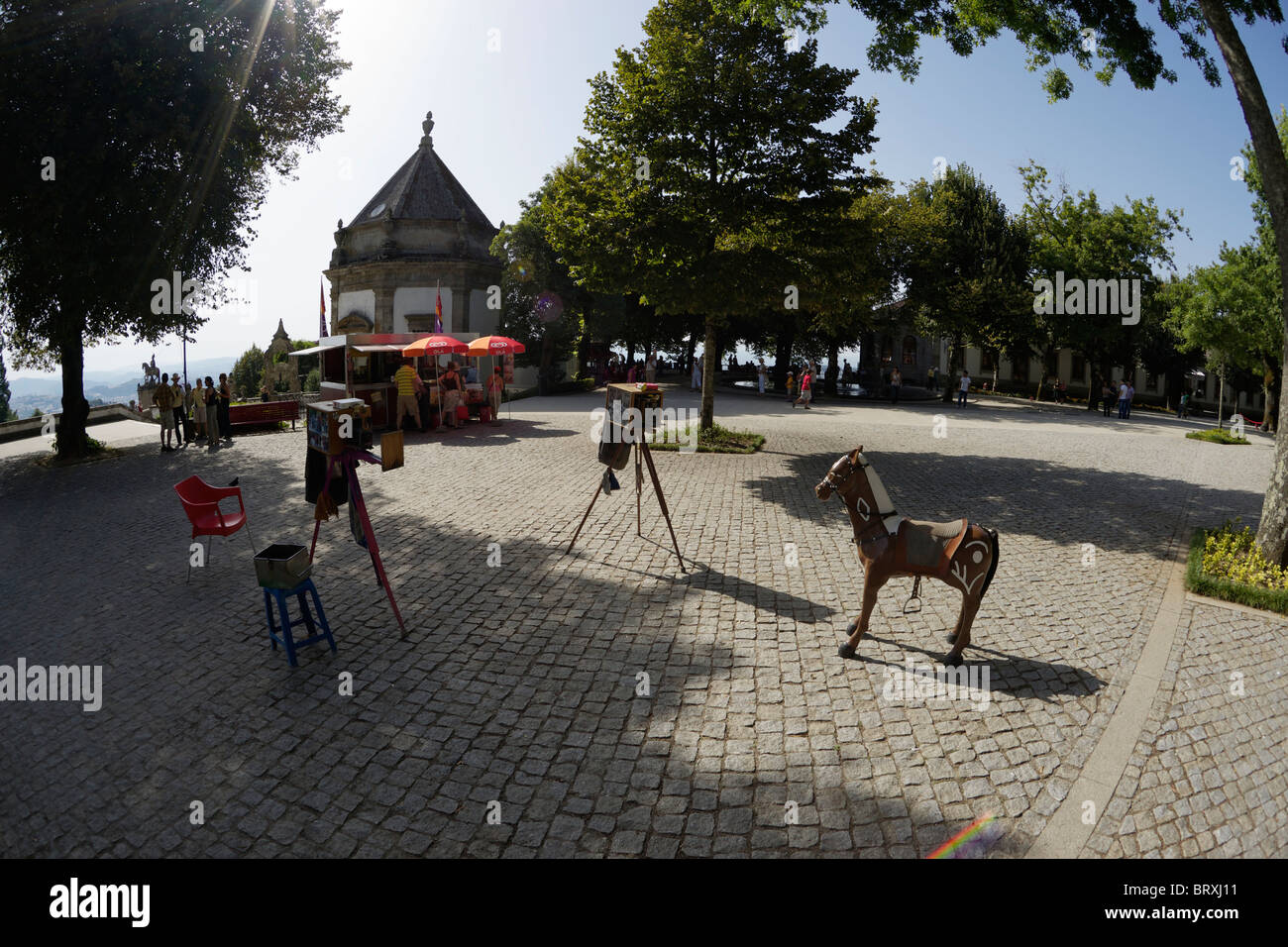 Wooden horse set up for photographing children by old fashioned cameras at the sanctuary of Bom Jesus do Monte in Portugal. Stock Photo