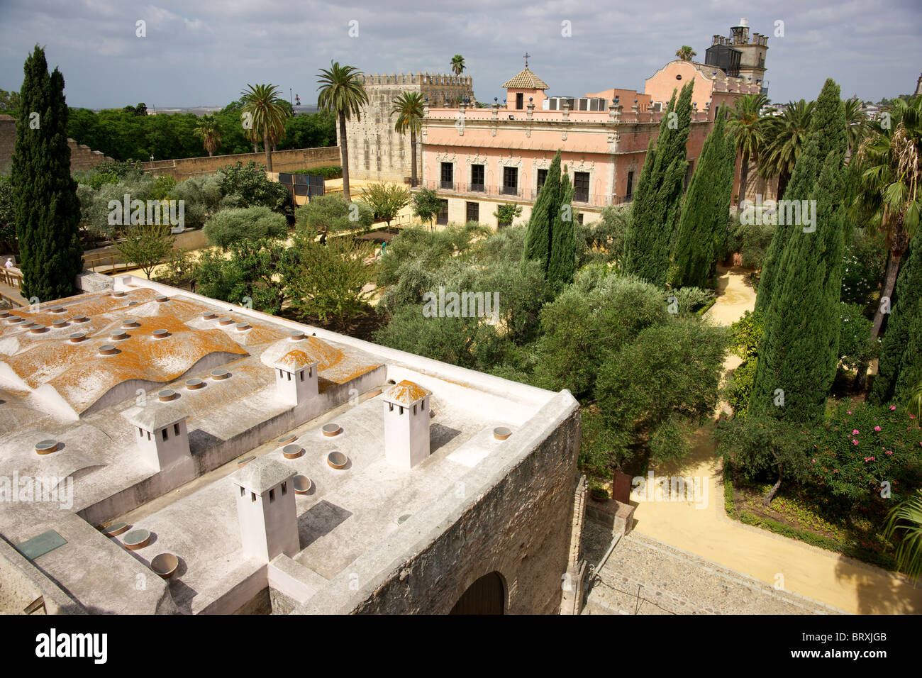 Alcazar gardens and buildings within the Moorish fortress. Stock Photo