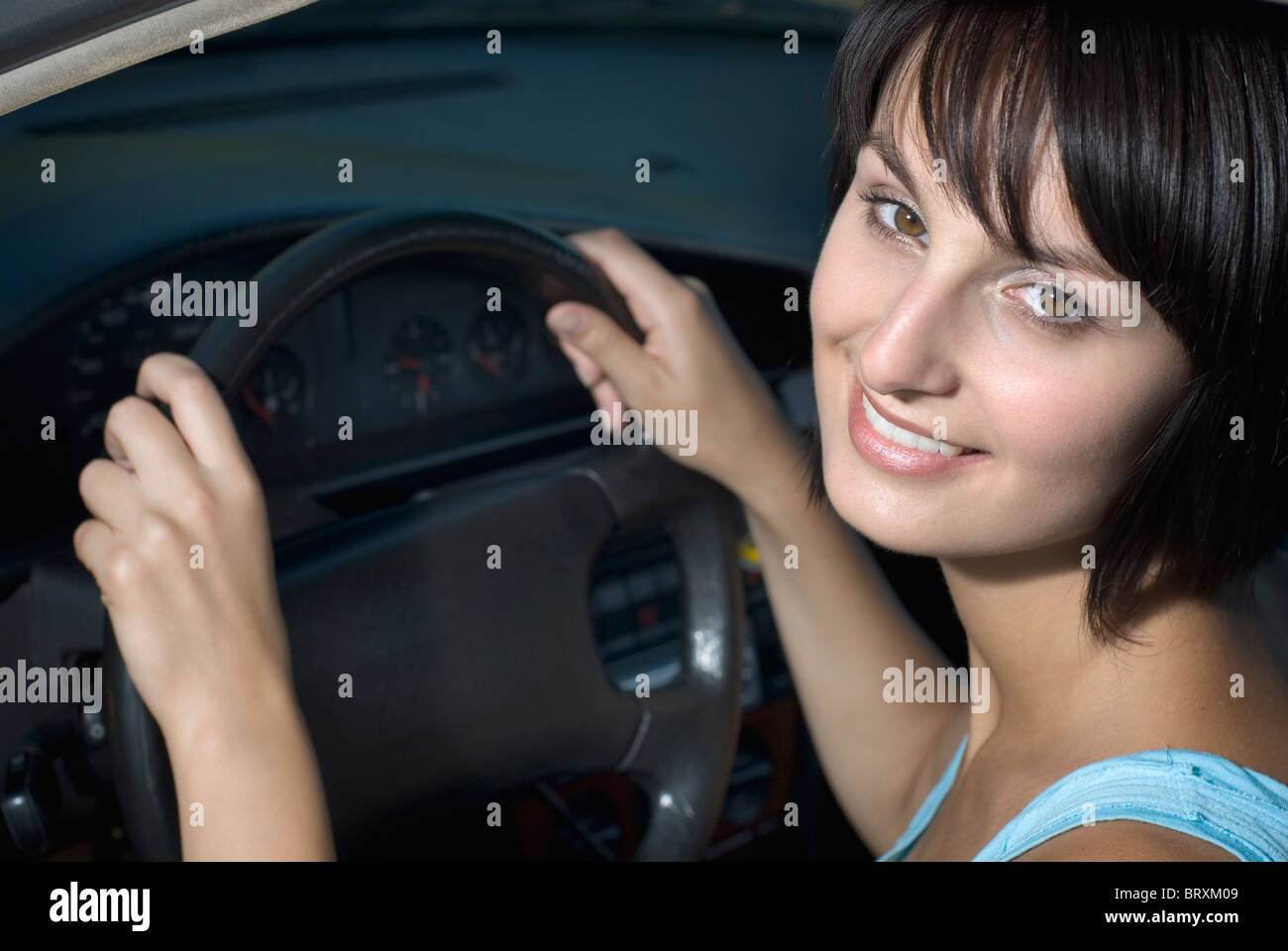 Sitting at wheel of car hi-res stock photography and images - Alamy