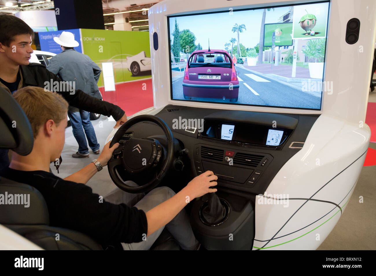 Driving simulator with video screen at Citroen stand at the Frankfurt Motor  Show 2009 Stock Photo - Alamy