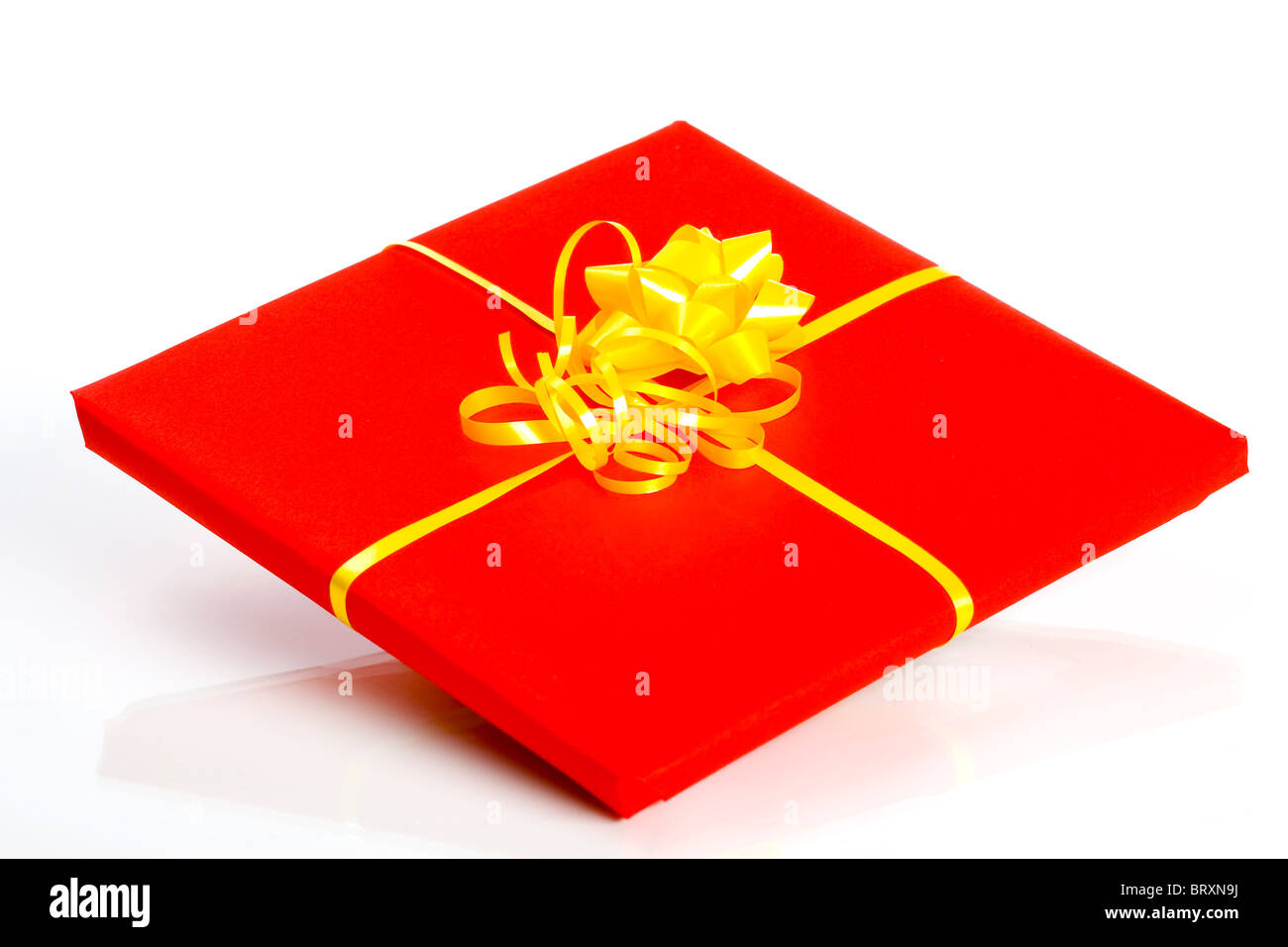 Single red gift box isolated on white background Stock Photo - Alamy