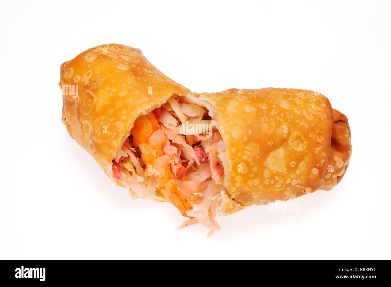 An eggroll cut in half showing its ingredients on white background cutout Stock Photo