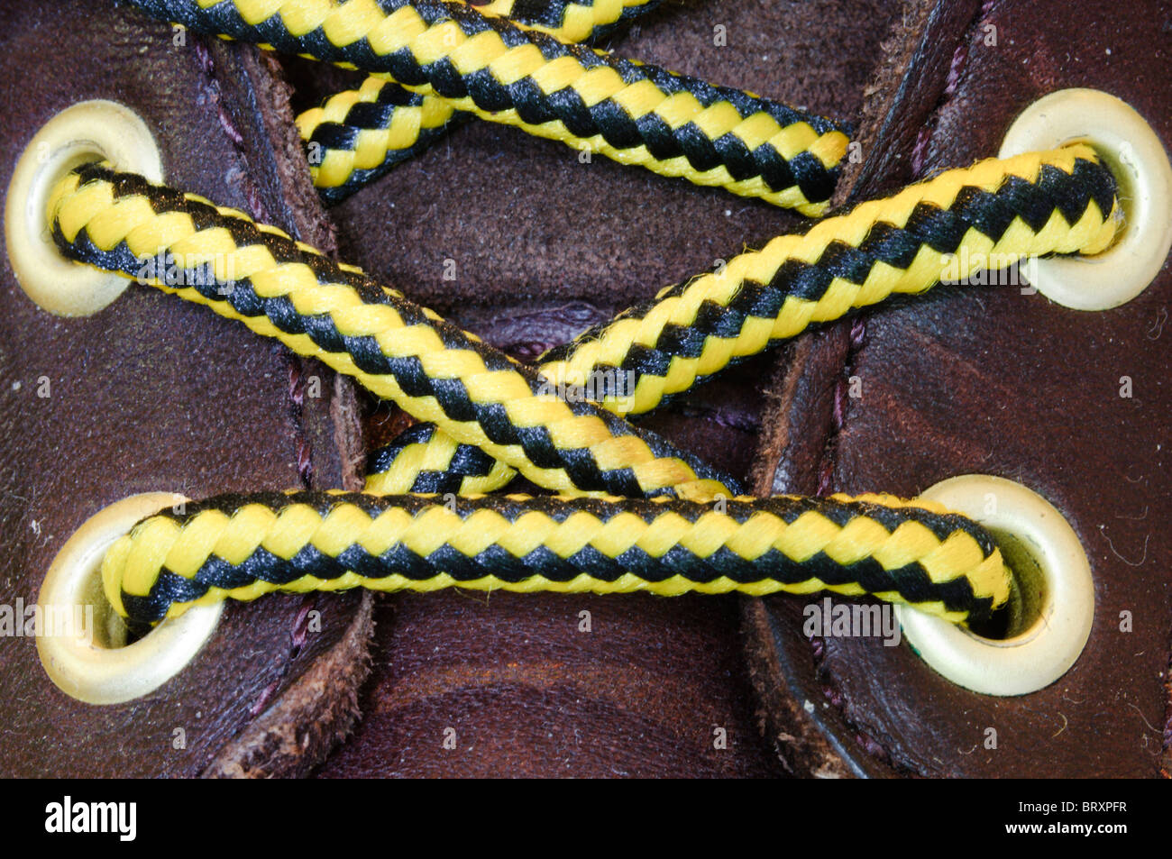 A close-up photograph of the laces on a pair of walking boots Stock Photo