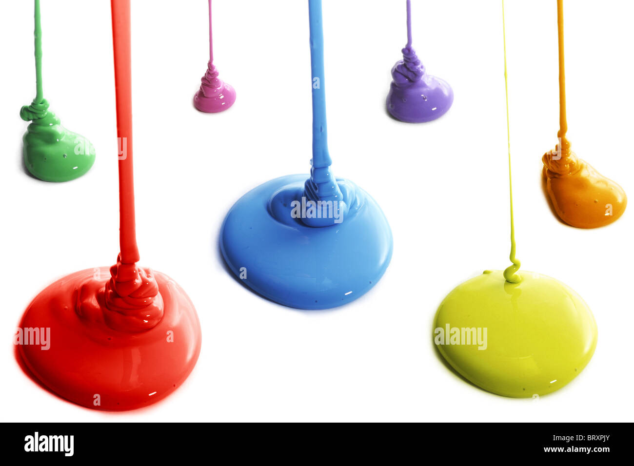 Several colors of paint pouring Stock Photo