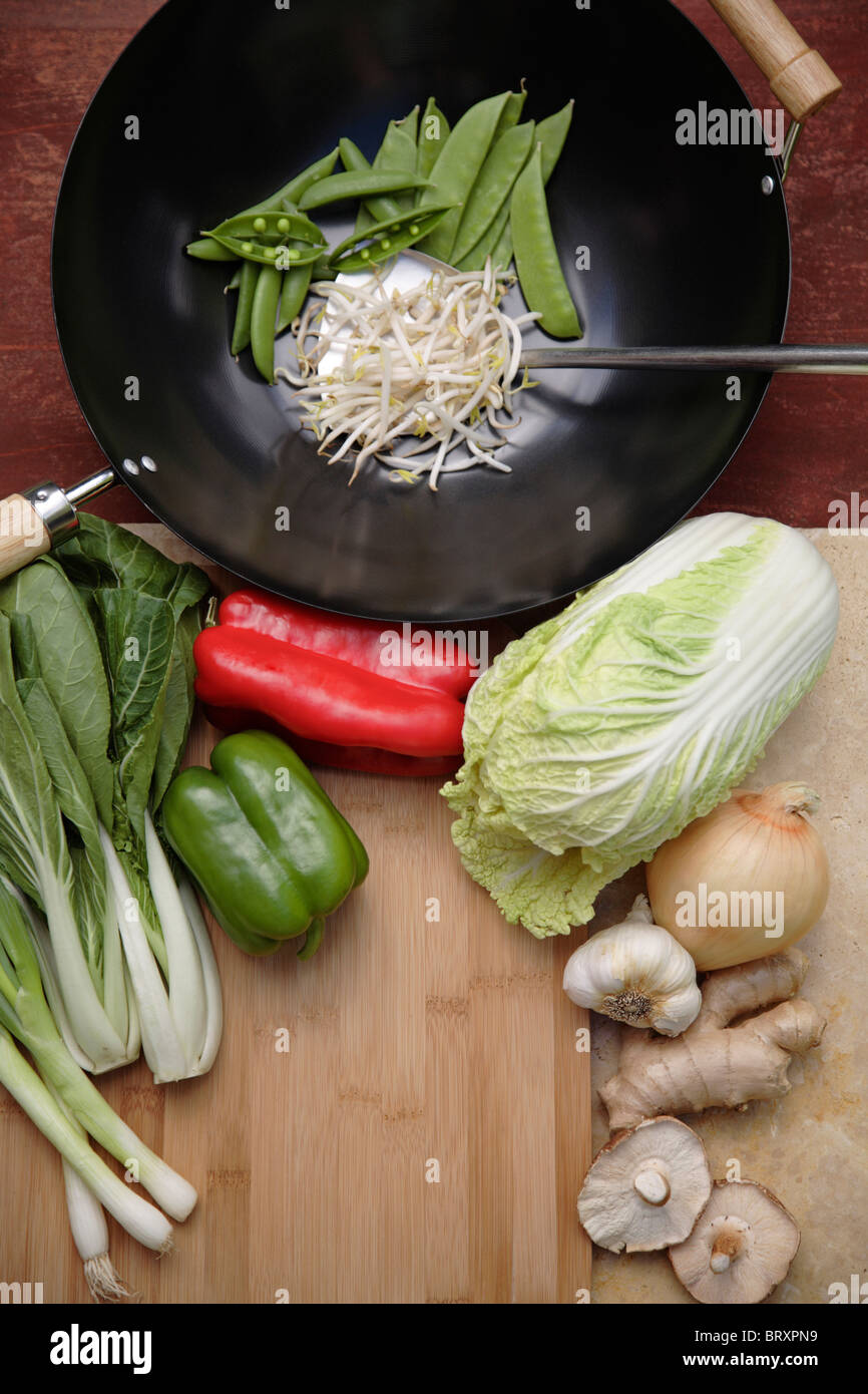 Variety of Asian stir fry ingredients and wok Stock Photo