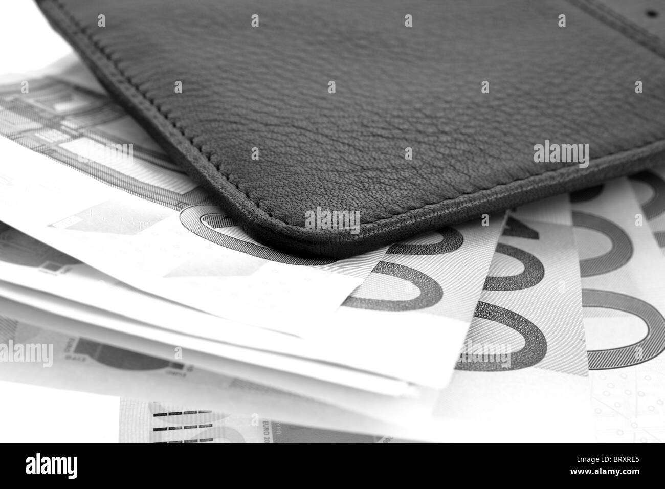 black leather wallet with euro notes in grayscale. horizontal shot Stock Photo