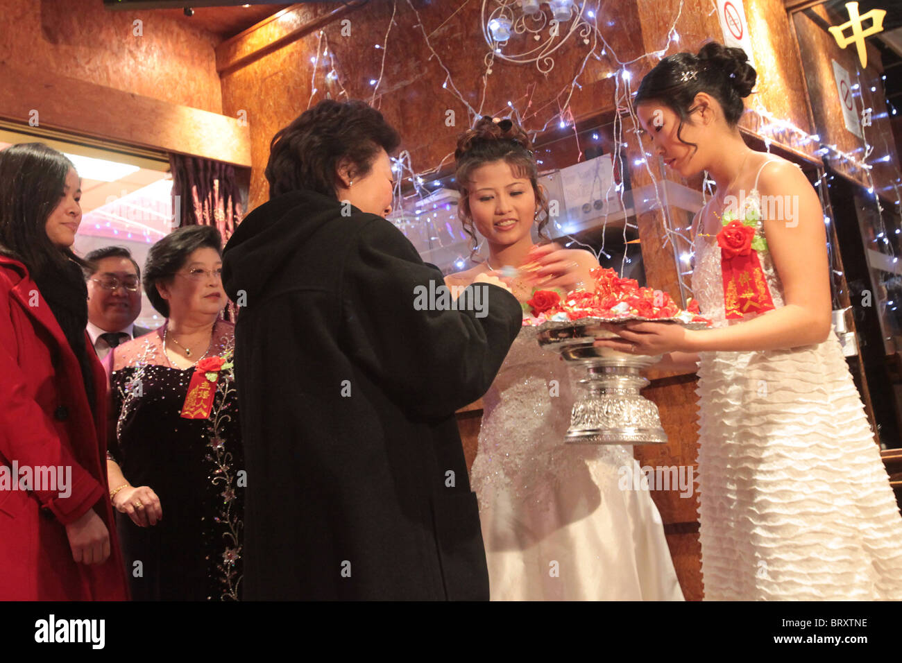 Traditional Chinese Wedding Reception Of The Guests By The Family