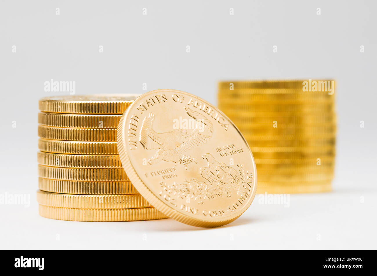 Stack of American coins on white background Stock Photo - Alamy