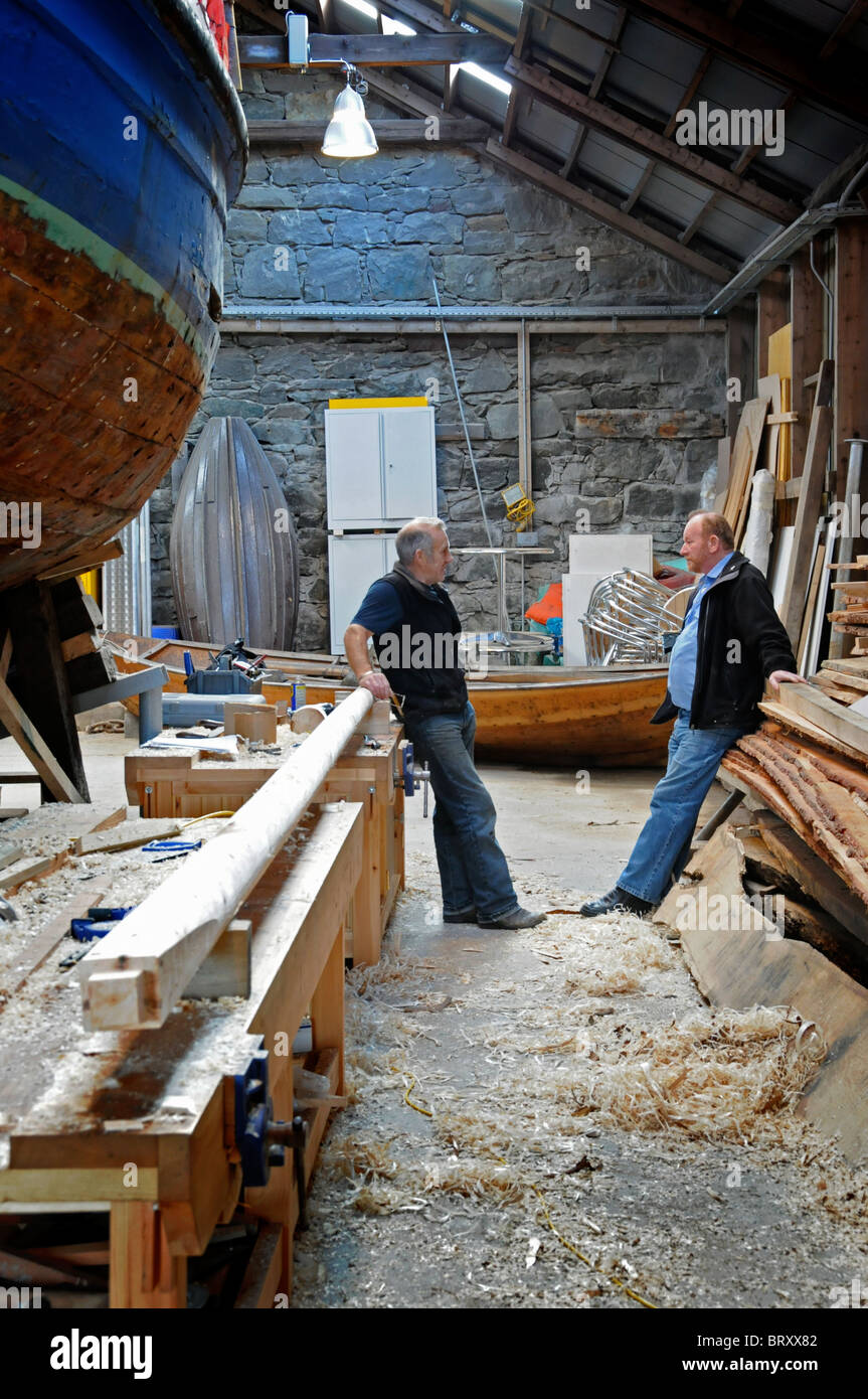 Shetland Boat builder Robbie Tait working in his workshop at the Shetland Museum Stock Photo