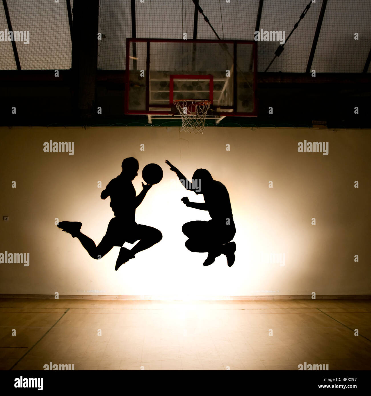 Basketball jump - black silhouette Stock Photo