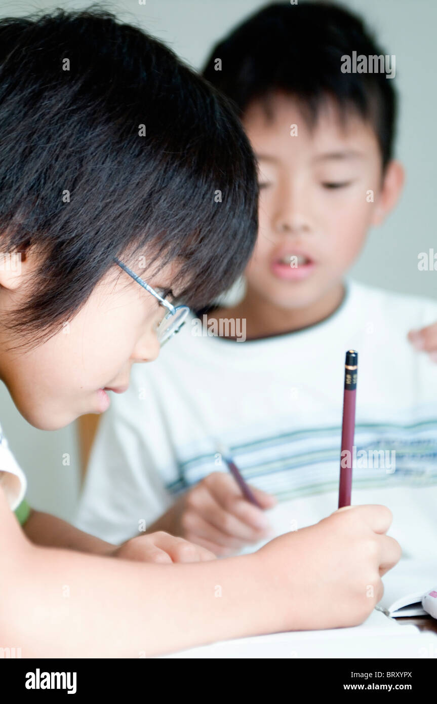Kids doing homework Japan Stock Photo Alamy