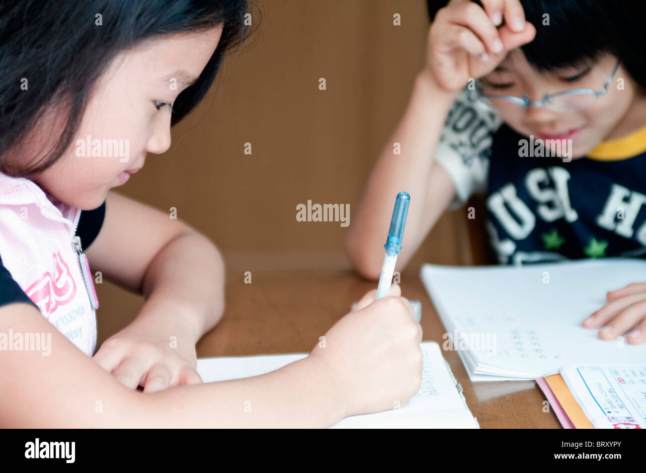 Kids doing homework Japan Stock Photo Alamy